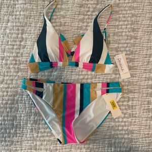 Raisins swimsuit NWT non smoking pet free home. Top is  M bottom is L
